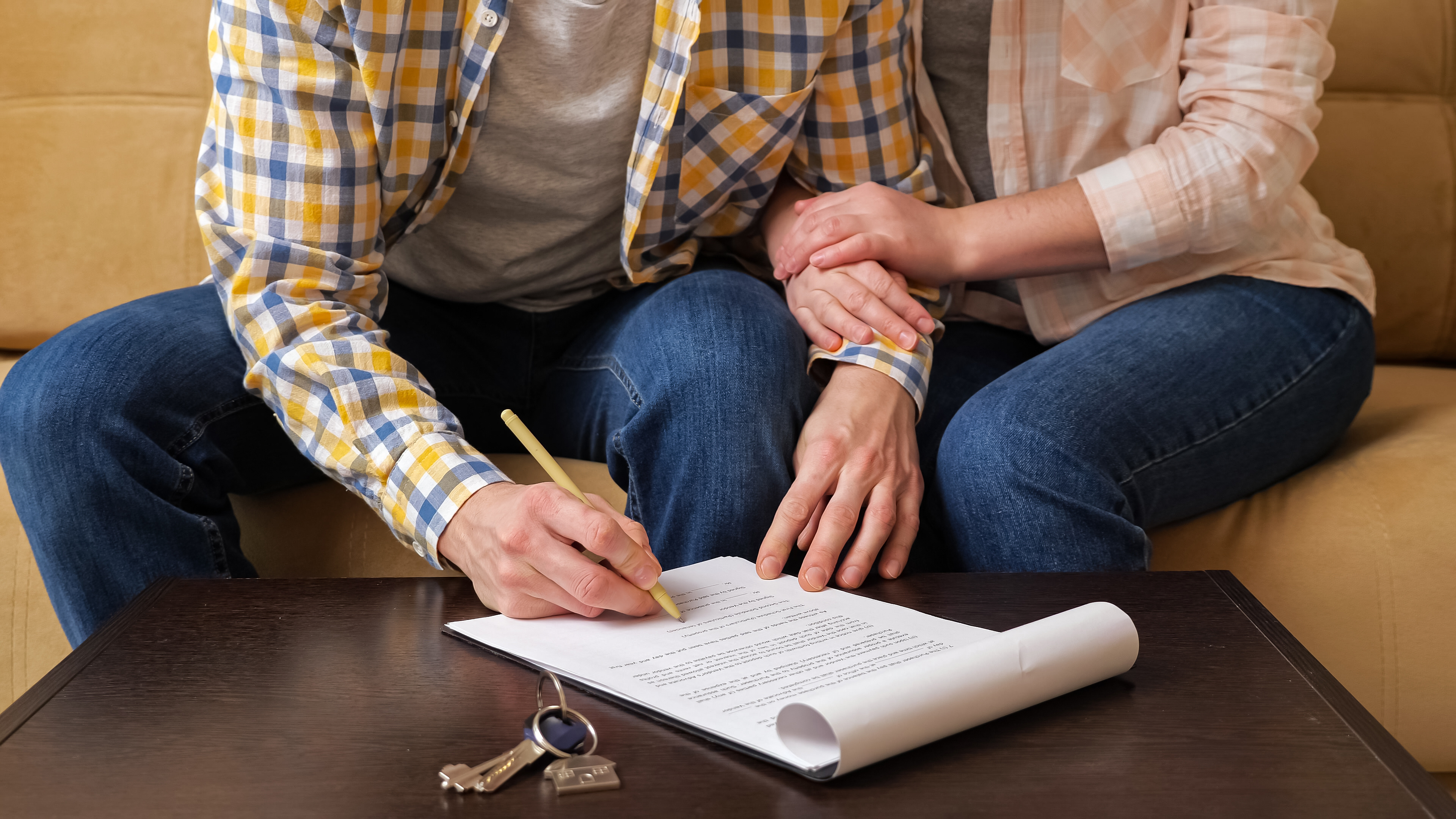 Couple signing License Agreement